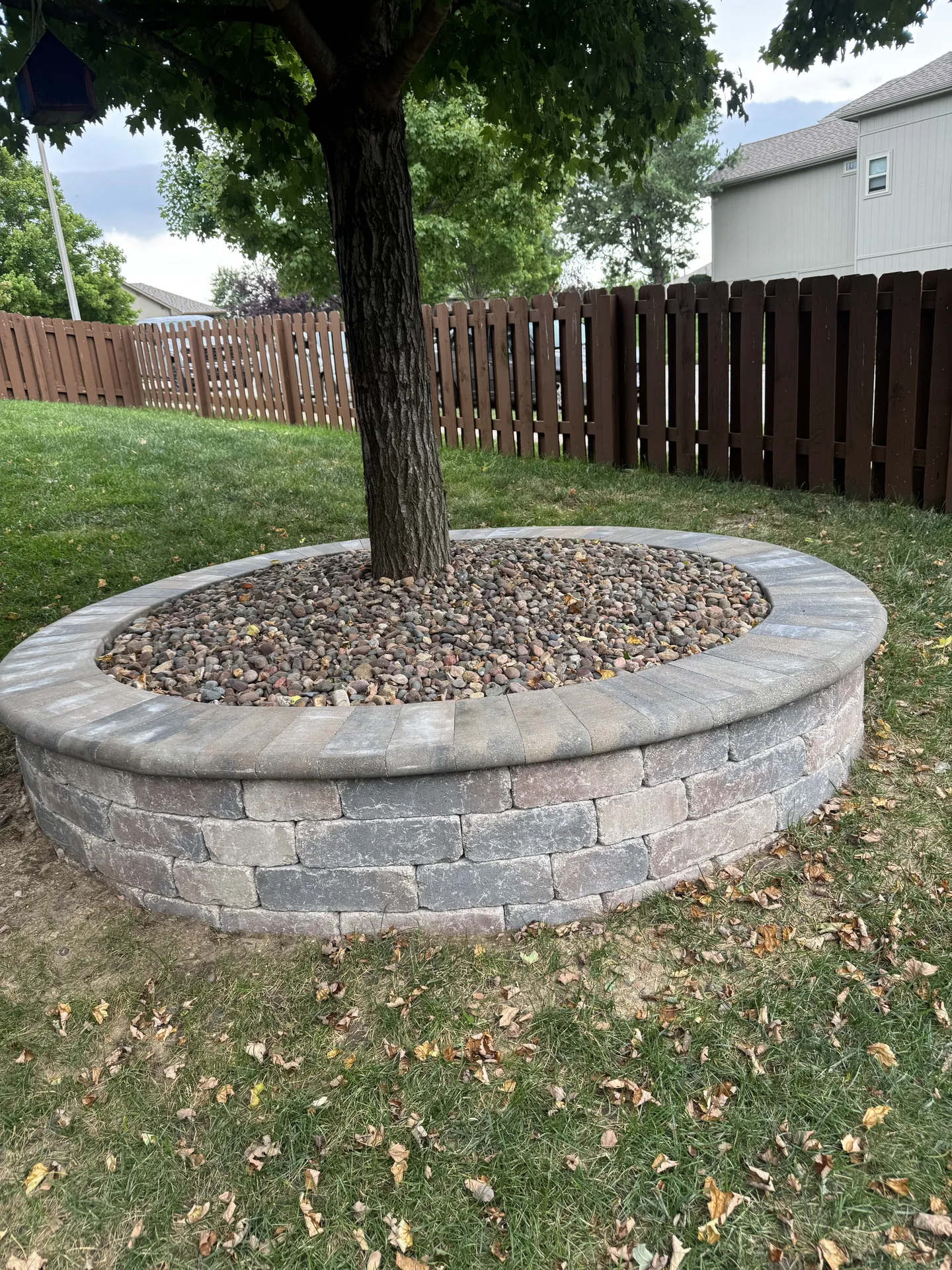 Circular stone tree ring retaining wall