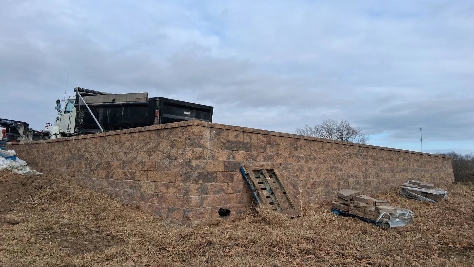 Large straight tall block retaining wall
